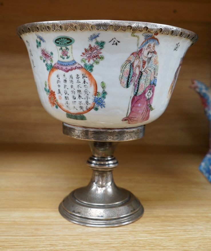 A mid 19th century Chinese famille rose bowl, with European silver mounts, 21cm. Condition - later silver mounts, hairline crack